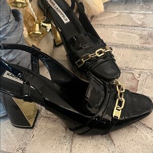 Karl Lagerfeld Glossy Black Heels with Gold Chain Accent